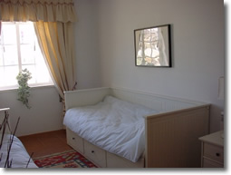 Third bedroom with double/twin beds.